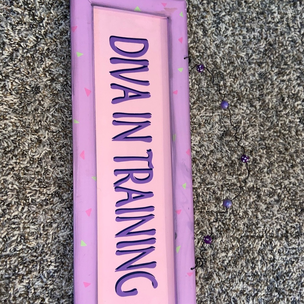 Diva in training sign